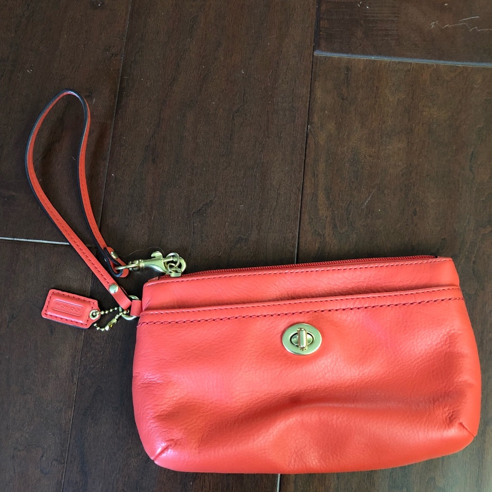 Coach coral wristlet